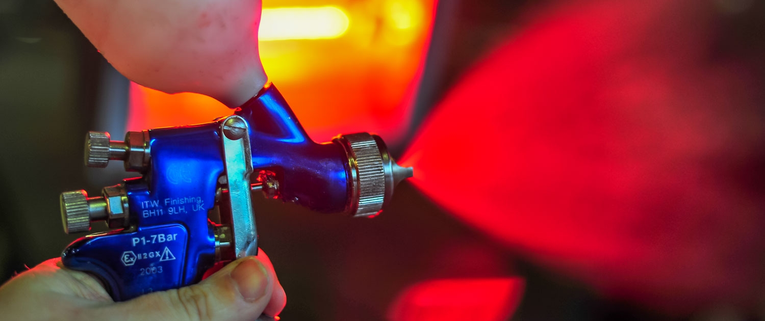 spray gun painting bumper repair