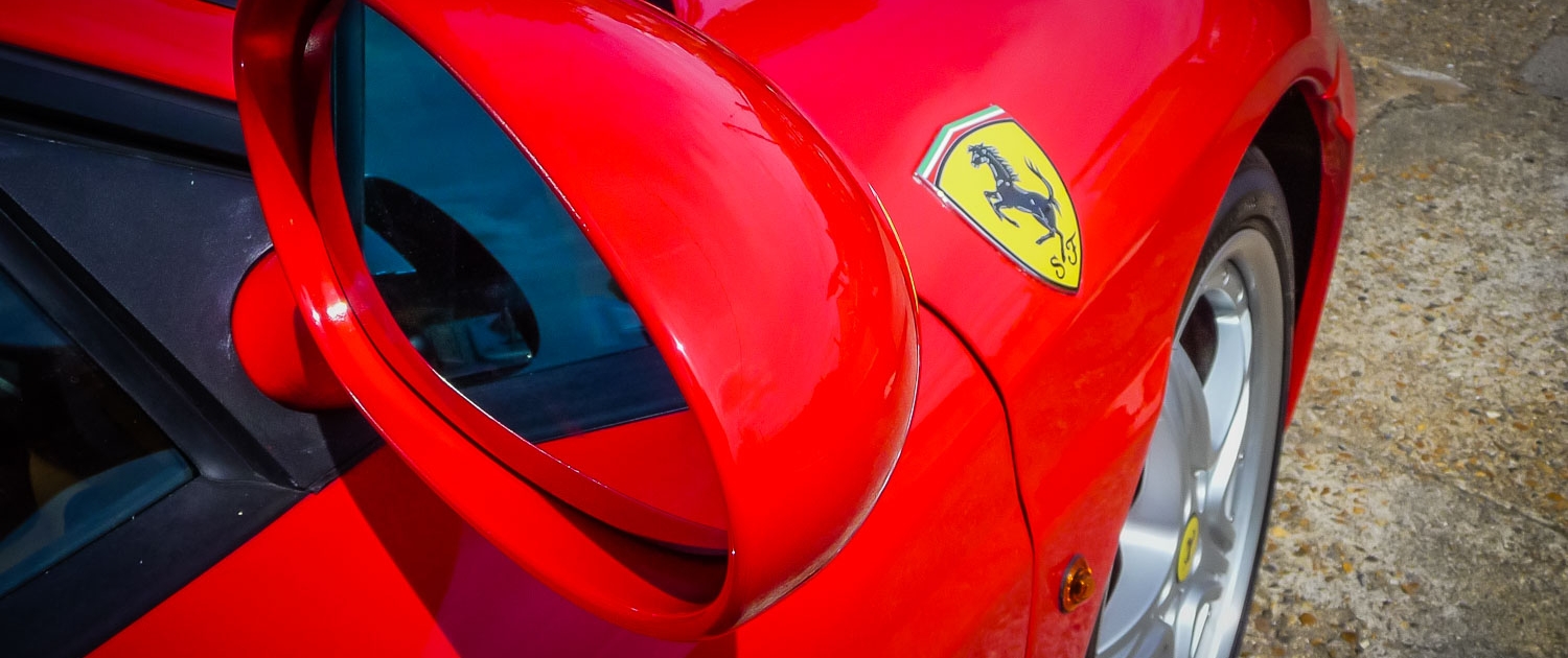 Attention to Detail mobile smart repairs paint scratch tidy ups to ferrari mirror image by Ian Skelton Photography