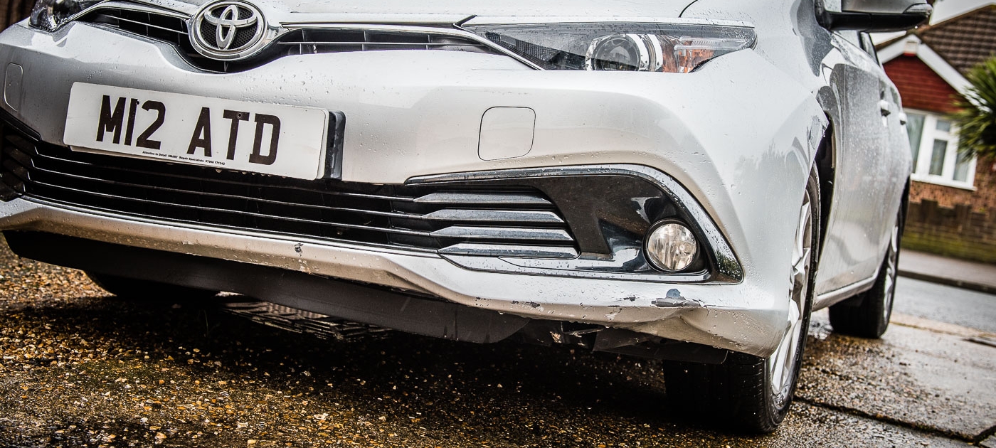 Toyota Auris front bumper side view before Attention to Detail mobile smart bumper repairs image by Ian Skelton Photography
